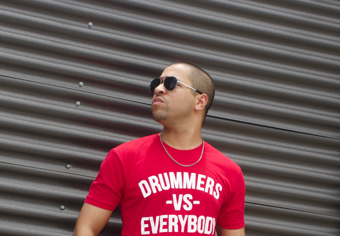DRUMMERS VS EVERYBODY TEE(red)
